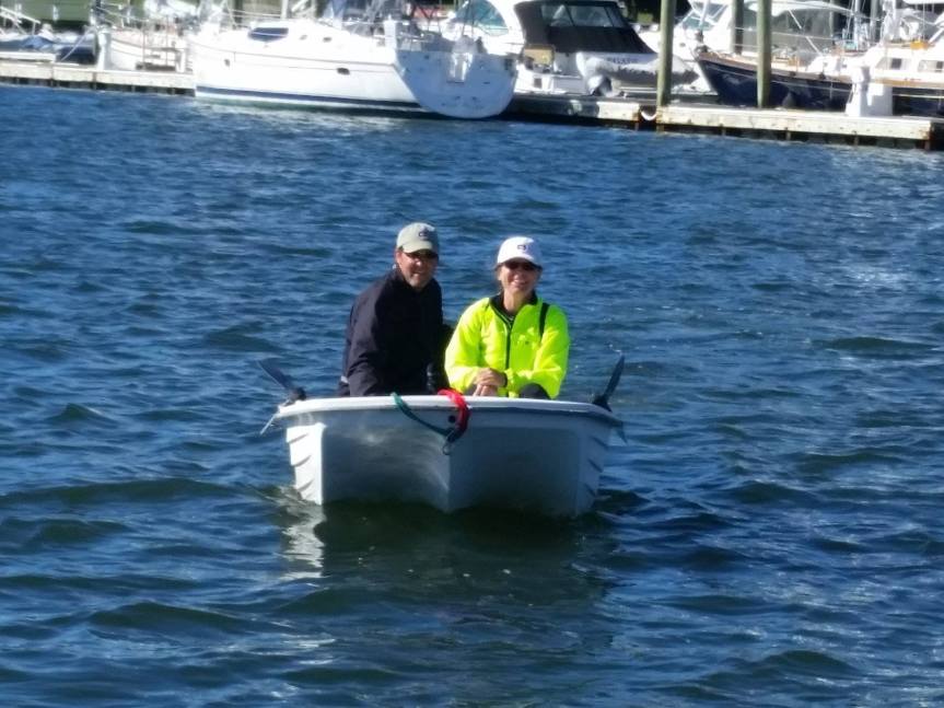 Jeff and I dinghying over to see Eric, Jeannette, and Chris.