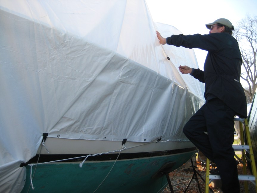 Jeff fine-tuning the tarp.